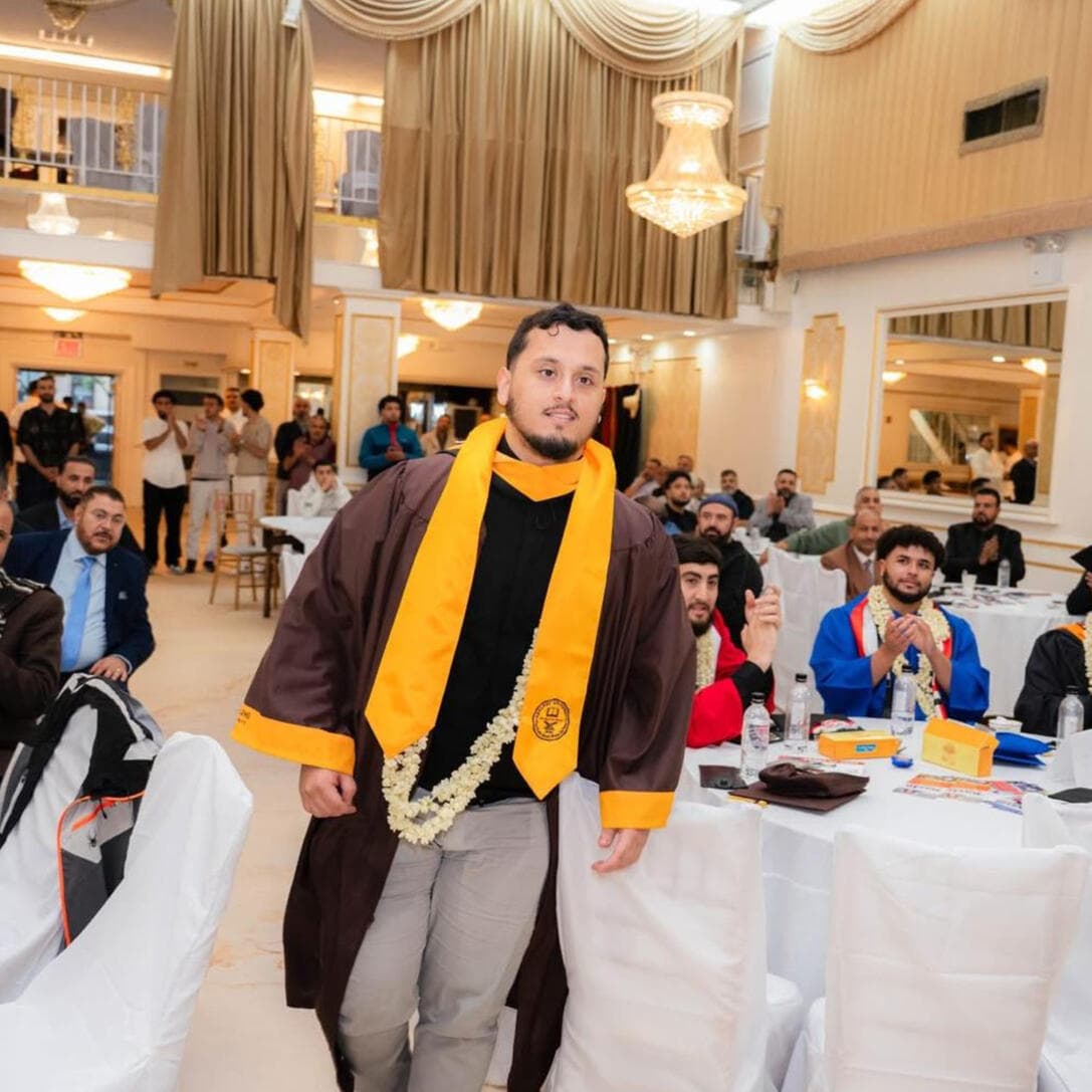 YCEC graduate celebrating educational program achievement in Brooklyn